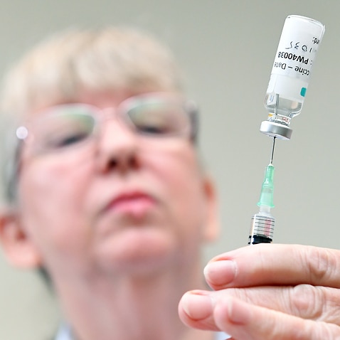 A nurse draws from a vial of Covid-19 vaccine at the Camp Hill Medical Centre n Brisbane on Monday, March 22, 2021. 