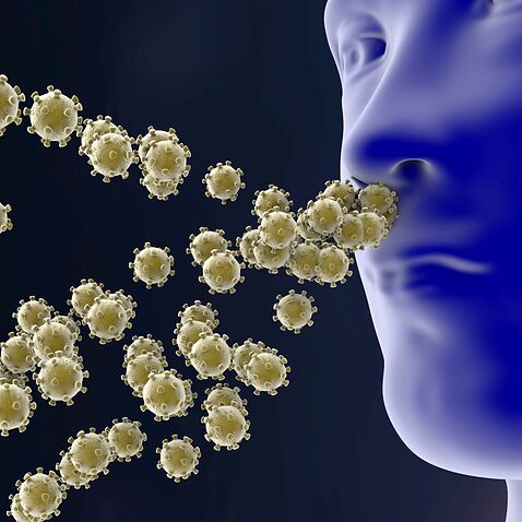 Infection of a person by respiratory viruses, illustration. Conceptual image.