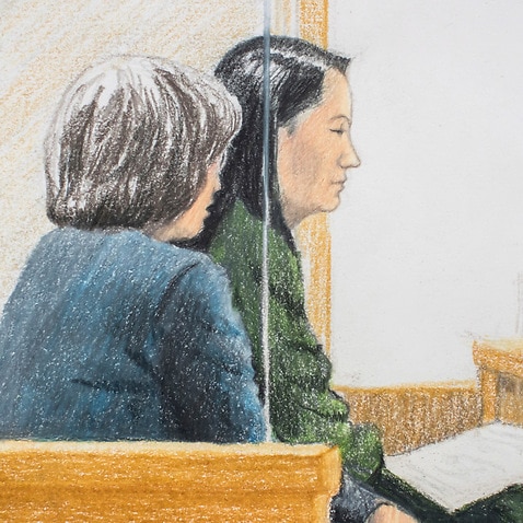 In this courtroom sketch, Meng Wanzhou, right, the chief financial officer of Huawei Technologies, sits beside a translator during a bail hearing.