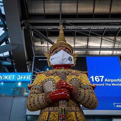 Masked Ramayana statue is pictured at the departures hall at Suvarnabhumi Airport