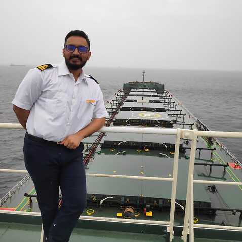 Virendrsingh Bhosale aboard his vessel, which is stranded off a Chinese port.