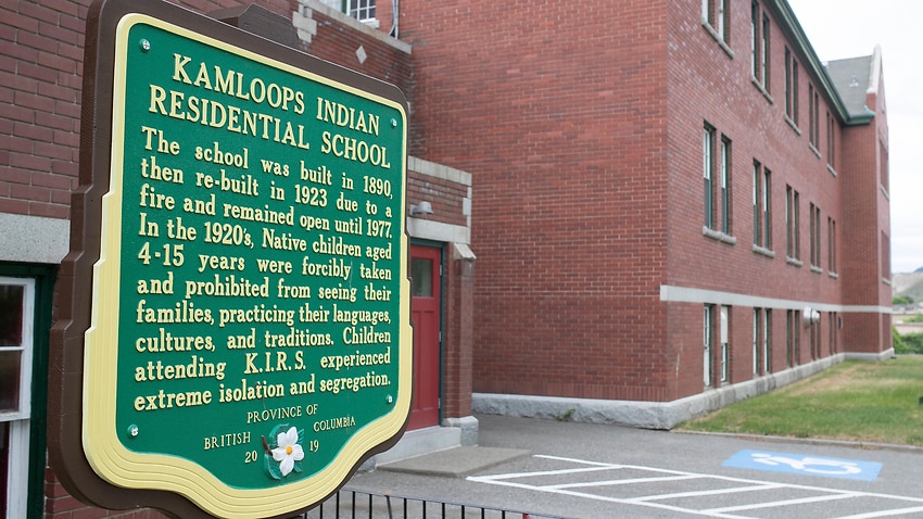 A plaque is seen outside of the former Kamloops Indian Residential School in Kamloops, on Thursday, May 27, 2021.