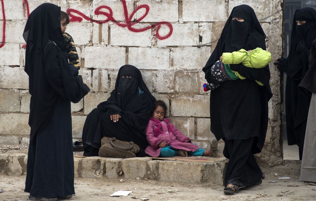 Displaced Syrian women and children at the Internally Displaced Persons (IDP) camp of al-Hol in al-Hasakeh governorate in northeastern Syria. Muslim women in Syrian camp