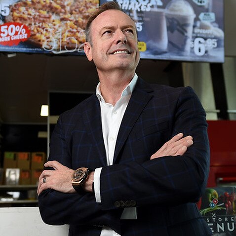 Don Meij, CEO of Domino's Pizza, poses for photos in one of the company's stores in Brisbane, Wednesday, Dec. 21, 2016. (AAP Image/Dan Peled) NO ARCHIVING