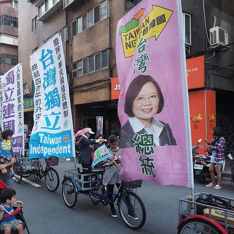 Banners showing Taiwan's President Tsai Ing-wen are on display near Tsai's campaign rally in Taipei, Taiwan, 17 November 2019. 