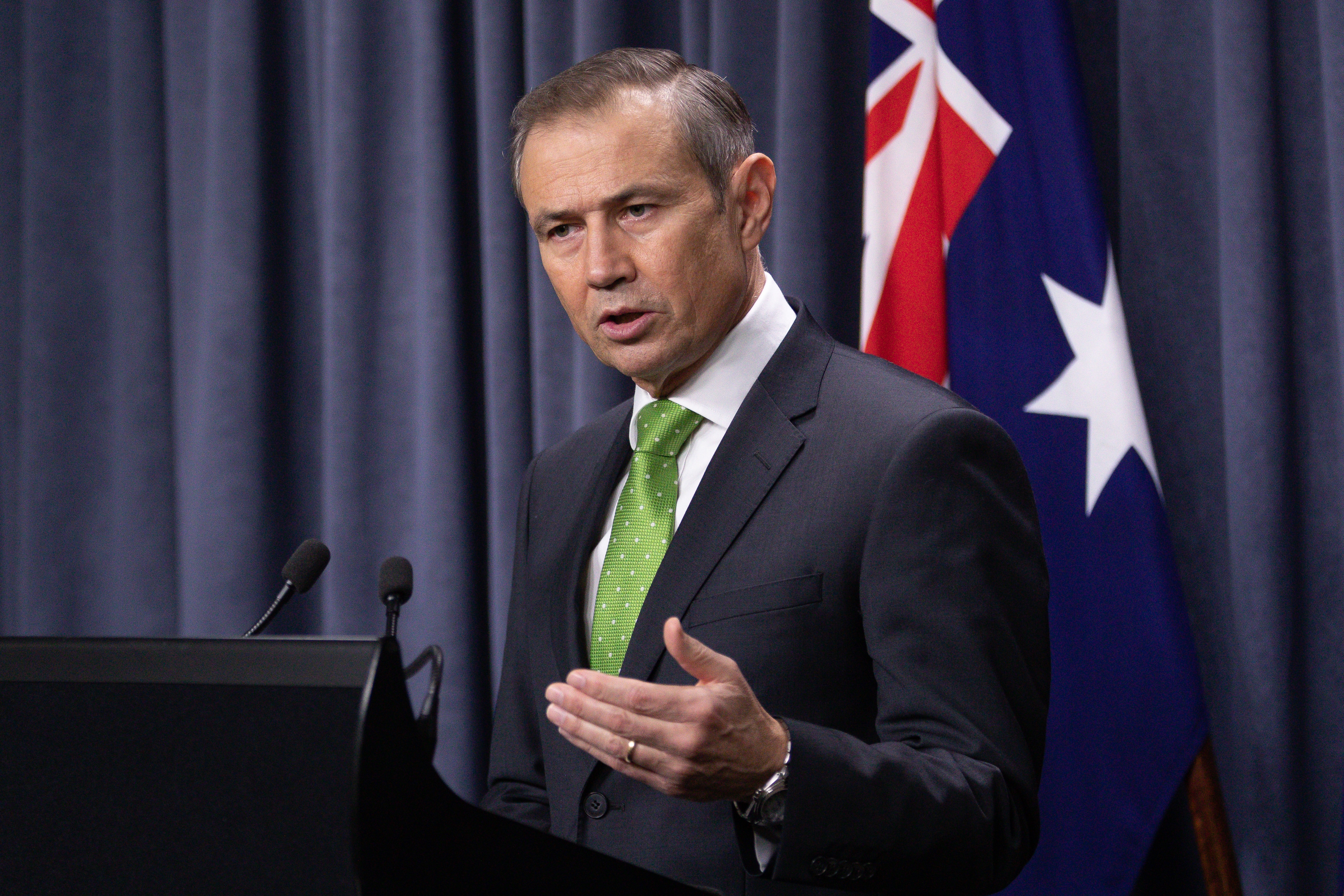 Western Australia Health Minister Roger Cook speaks at a press conference in Perth.