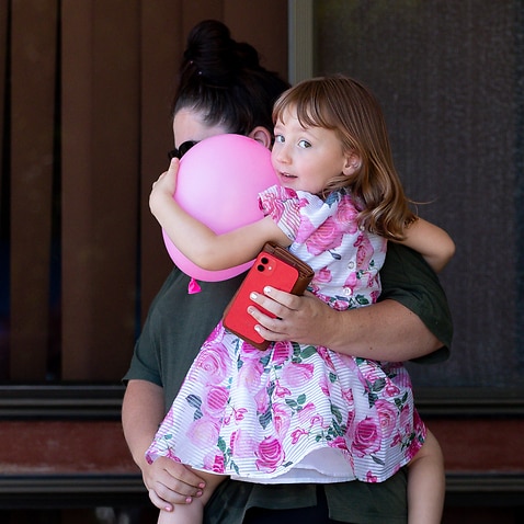 Cleo Smith (4) and her mum Ellie Smith are seen leaving a house where she spent her first night after being rescued in Carnarvon, 900km north of the capital Perth in Western Australia, Thursday, November 4, 2021. Four-year-old Cleo Smith has been found al