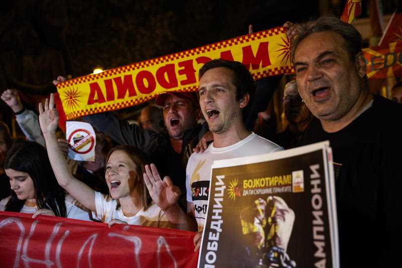 The opponents of the referendum celebrate the small response of the voters on the referendum on the country's name change in front of the Parliament building in Skopje , The Former Yugoslav Republic of Macedonia, 30 September 2018.