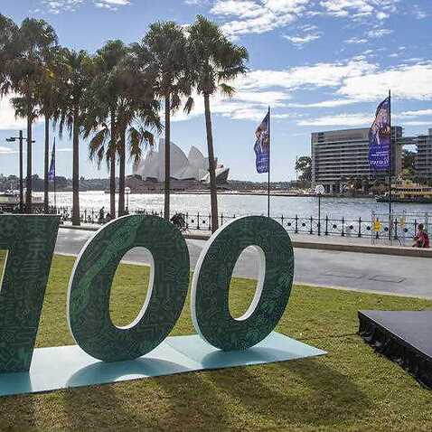 A sign to mark 100 days before the start of the Tokyo Olympics in Sydney Wednesday, April 14, 2021. Olympics live sites will be held across Australia during the Olympic Games, from July 23 to Aug. 8 2021.