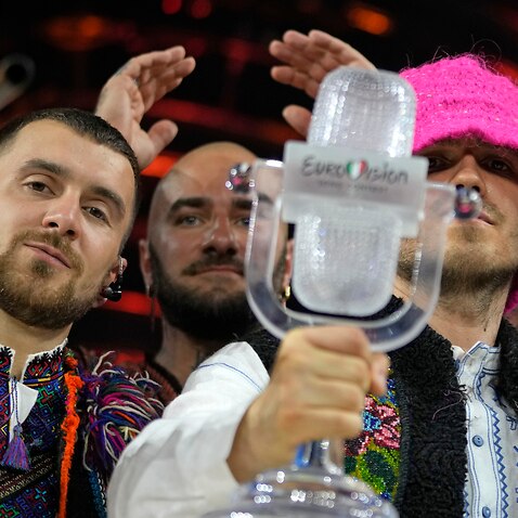 Members of the Kalush Orchestra from Ukraine winning the Grand Final of the Eurovision Song Contest Italy, Saturday, May 14, 2022. (AP Photo/Luca Bruno)