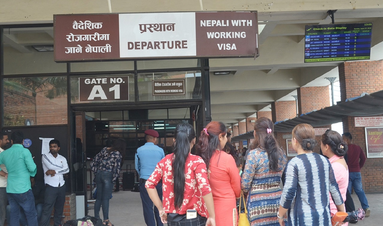 Relatives wait for migrant workers in Nepal