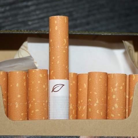 An open pack of cigarette
