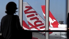 A Virgin Australia plane is seen at Sydney Airport, Wednesday February 28, 2018. Virgin Australia's board has decided against delisting the airline from the ASX following discussions with major shareholders. (AAP Image/Peter Rae) NO ARCHIVING
