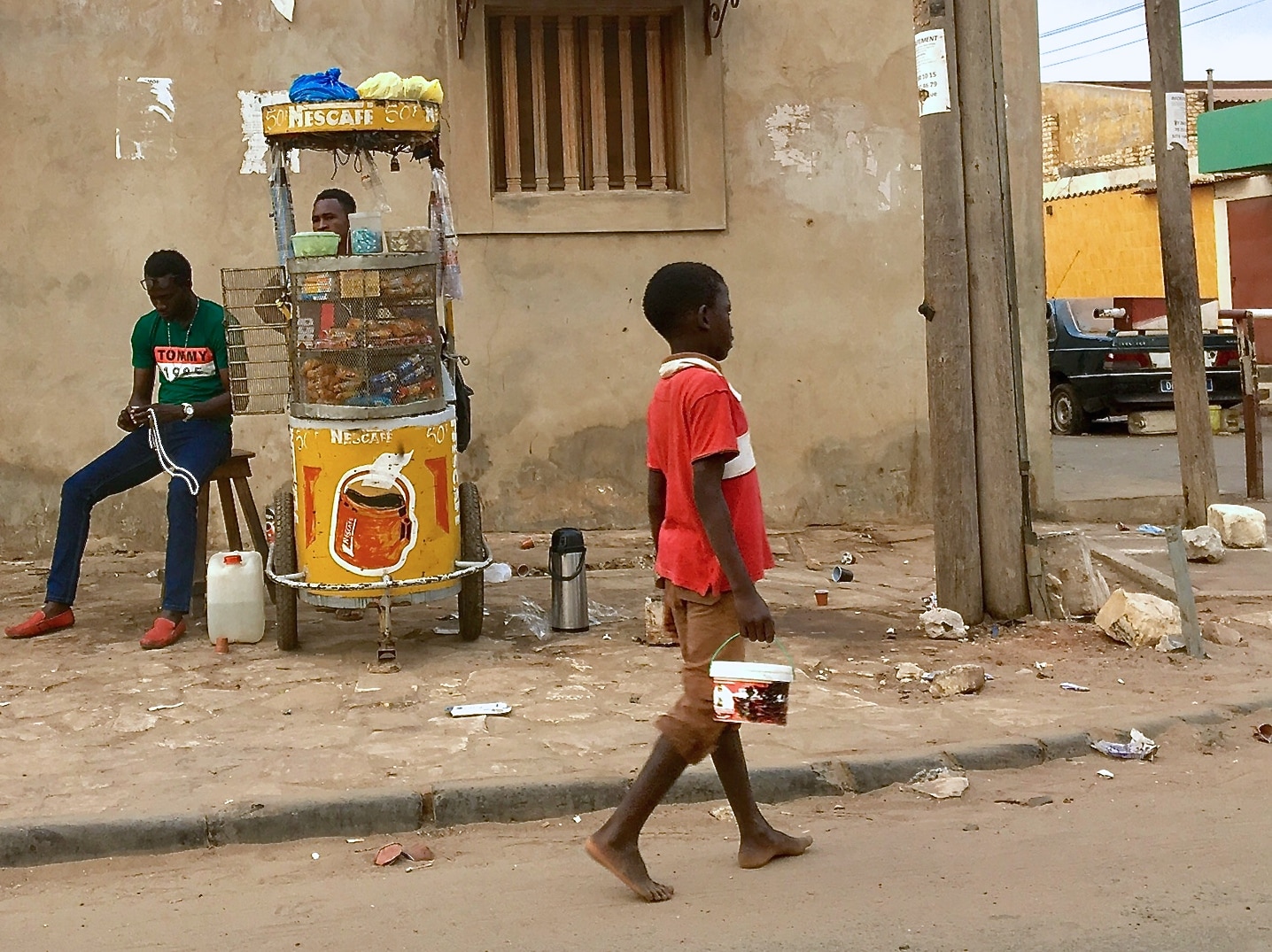 Boys often hold empty tomato cans or plastic bowls as they beg for money. Boys often hold empty tomato cans or plastic bowls as they beg for money.