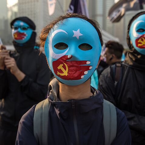 Protesters attend a rally in Hong Kong on 22 December, 2019, to show support for the Uighur minority in China. 