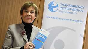 Edda Mueller, chairwoman of Transparency International Germany e.V. poses for the media with the Corruption Perceptions Index 2018.