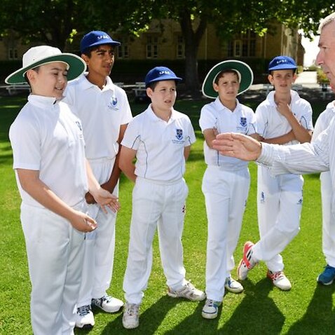 Former test cricket player Rod Marsh is seen coaching students from St Peters College in Adelaide on St Peters Oval, Friday November 2, 2018. Rod Marsh is touring the country to promote his new book an autobiography. (AAP Image/David Mariuz) NO ARCHIVING