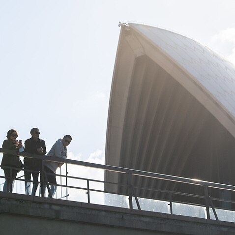 People seen near the Sydney Opera House, Sydney, Saturday, June 6, 2020.