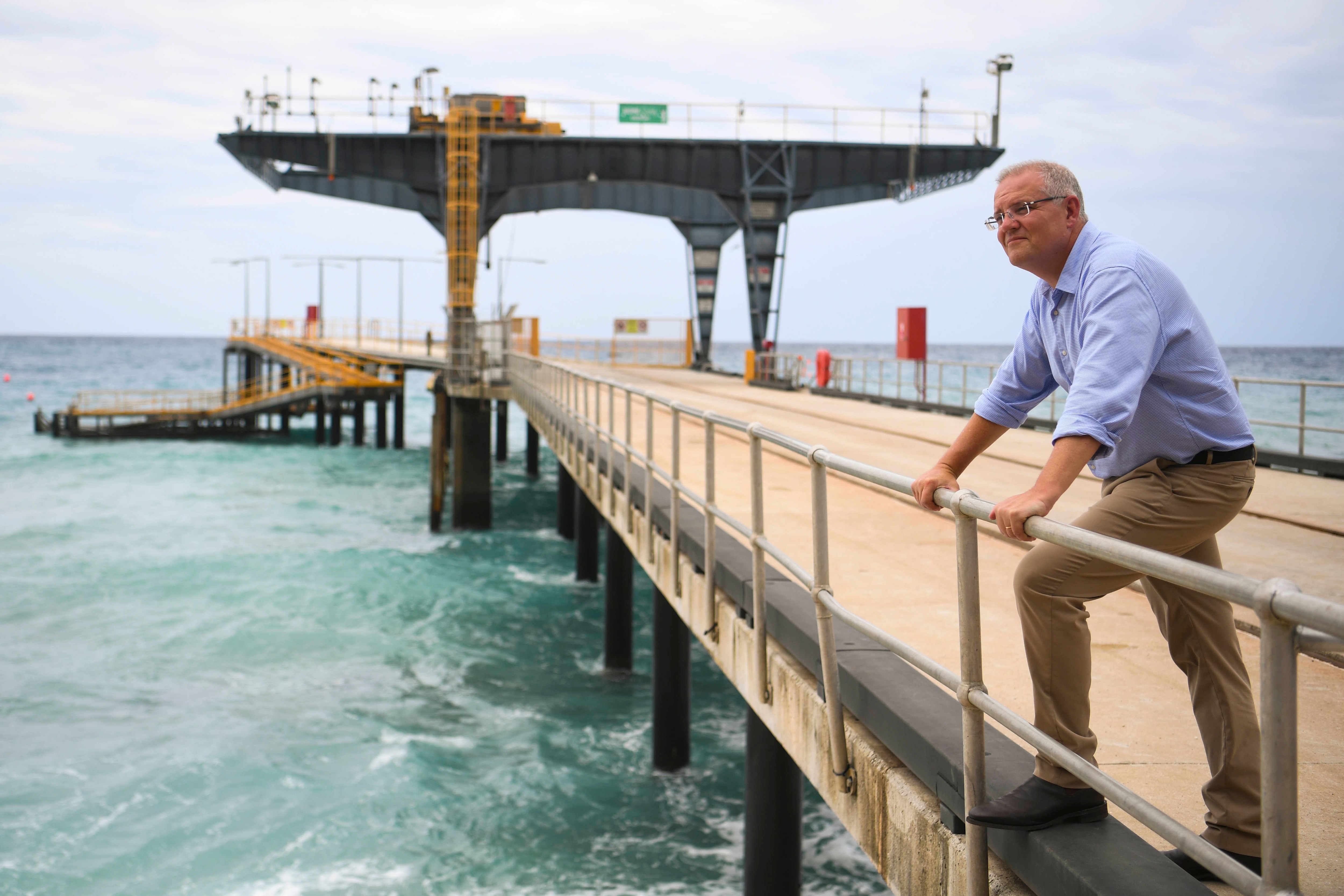 Australian Prime Minister Scott Morrison poses on the Christmas Island jetty