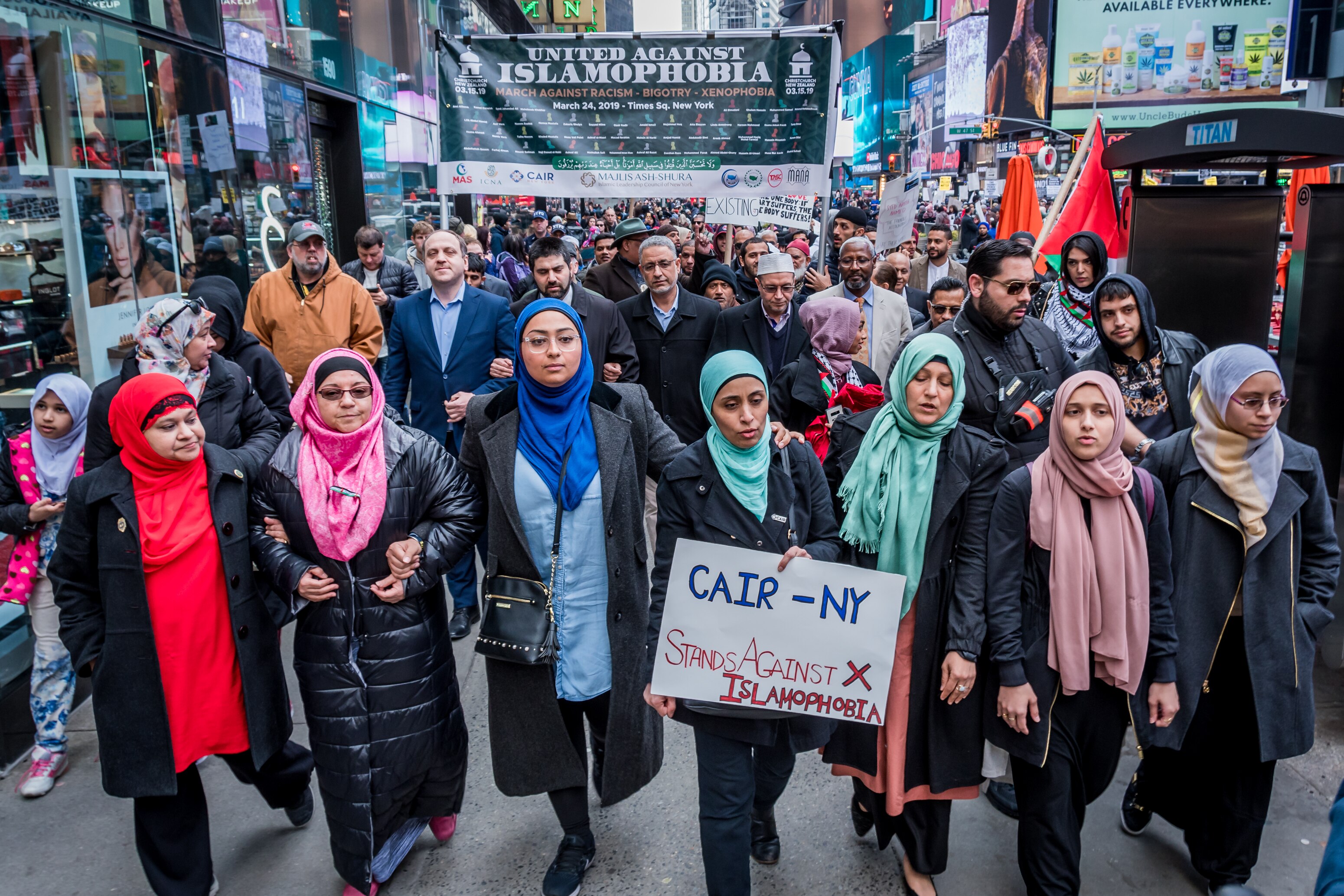 Muslim leaders and allies at a 2019 rally against Islamophobia in New York's Times Square.