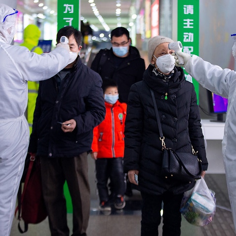 People back to work at the last day of spring festival travel season during the novel coronavirus pneumonia epidemic period in Nanjing, Jiangsu, China.