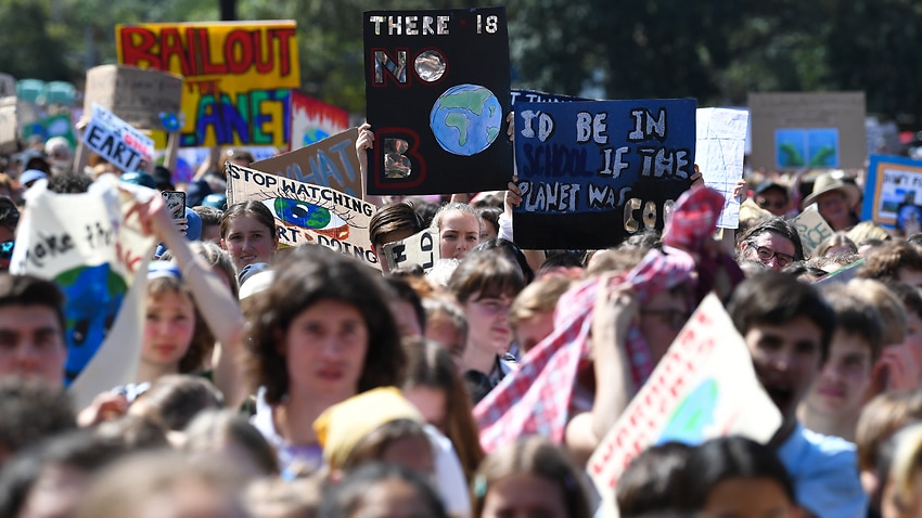 Protesters with placards participate in The Global Strike 4 Climate rally in Sydney, Friday 20 September, 2019.