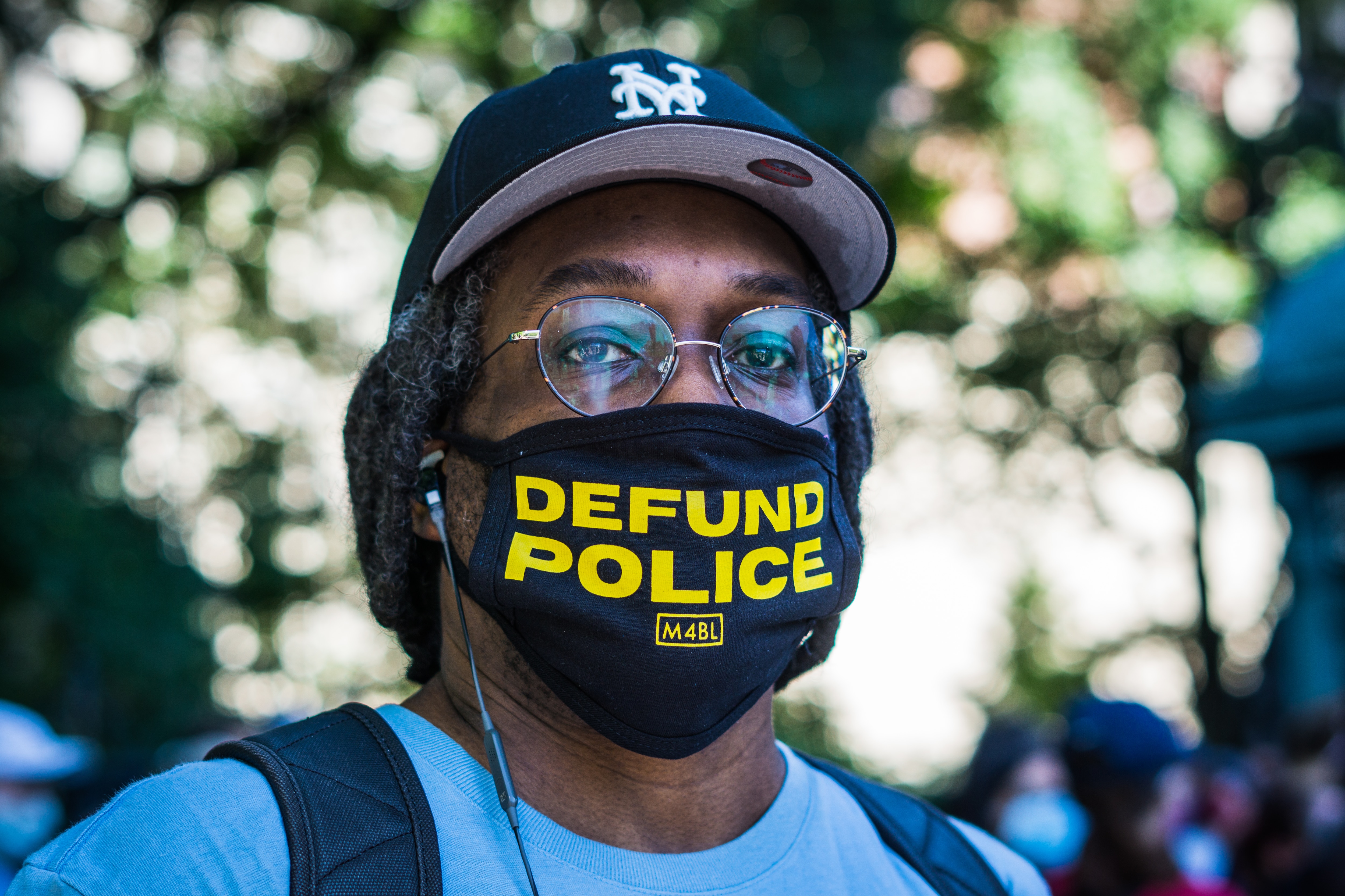 New York City Workers for Justice hold a protest calling for the city's administration to hold police officers accountable for brutality and racial profiling.