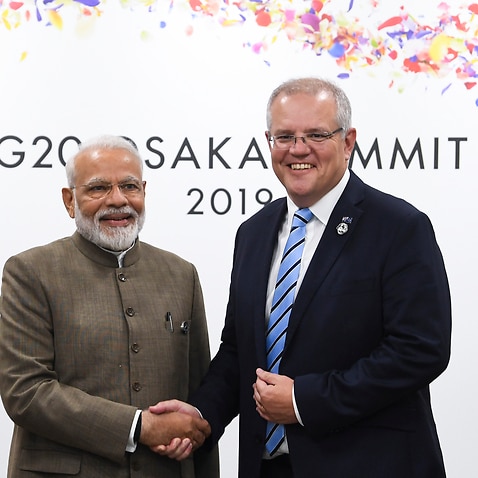 Prime Minister Scott Morrison (right) shakes hands with Indian Prime Minister Narendra Modi during a bilateral meeting at the G20 summit in Osaka, Japan.