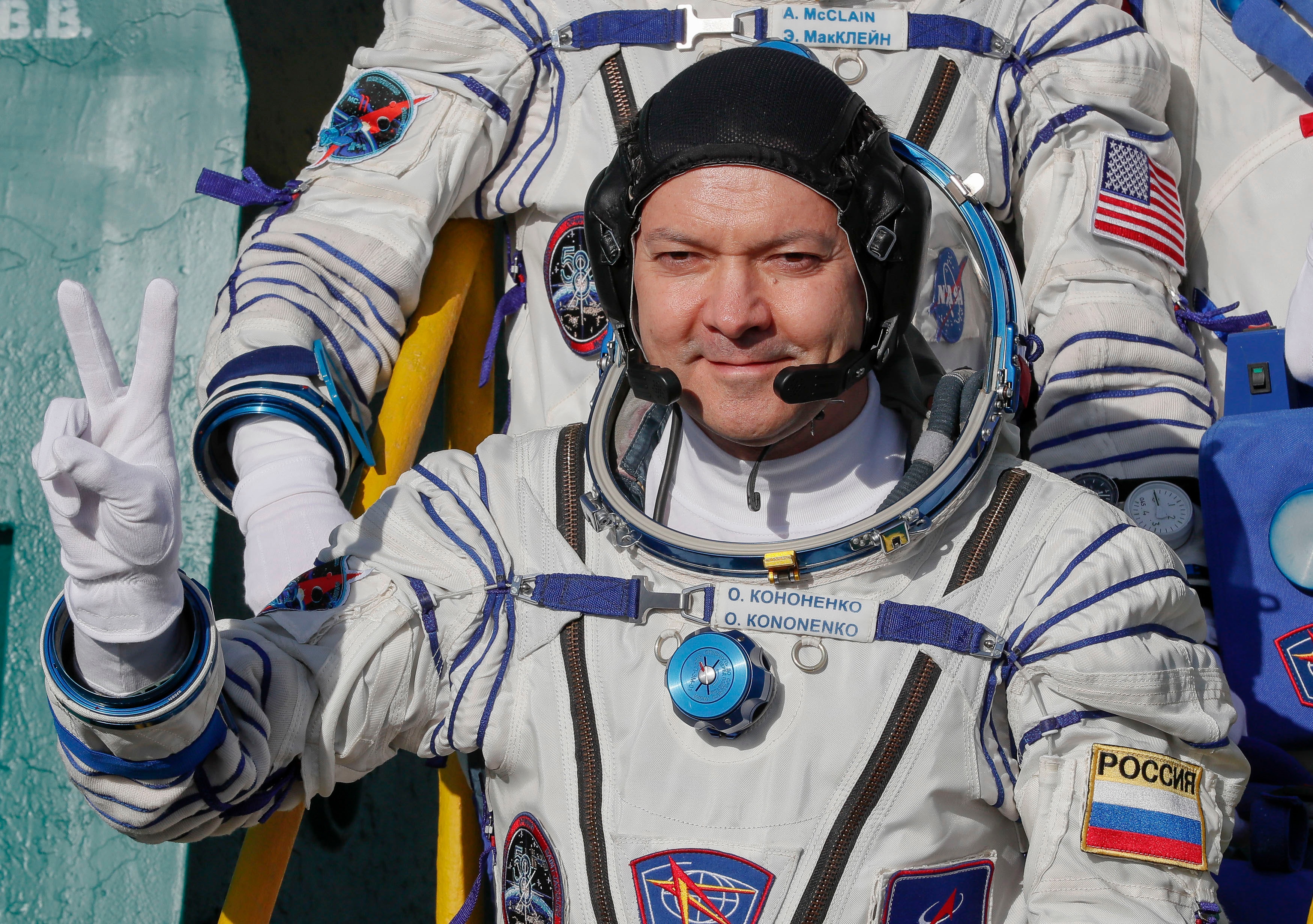 Russian cosmonaut Oleg Kononenko as he boards the Soyuz ship, bound for the ISS.
