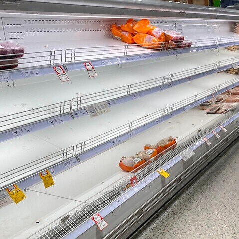 Empty shelves of meat products are seen at a supermarket in Sydney, Friday, January 7, 2022.