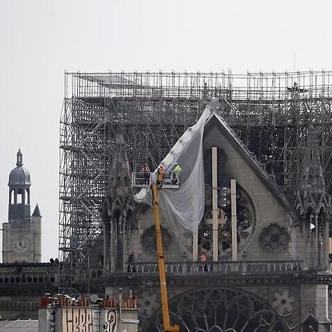 The fire-ravaged Notre Dame cathedral remains fragile and extremely dangerous, firefighters say.