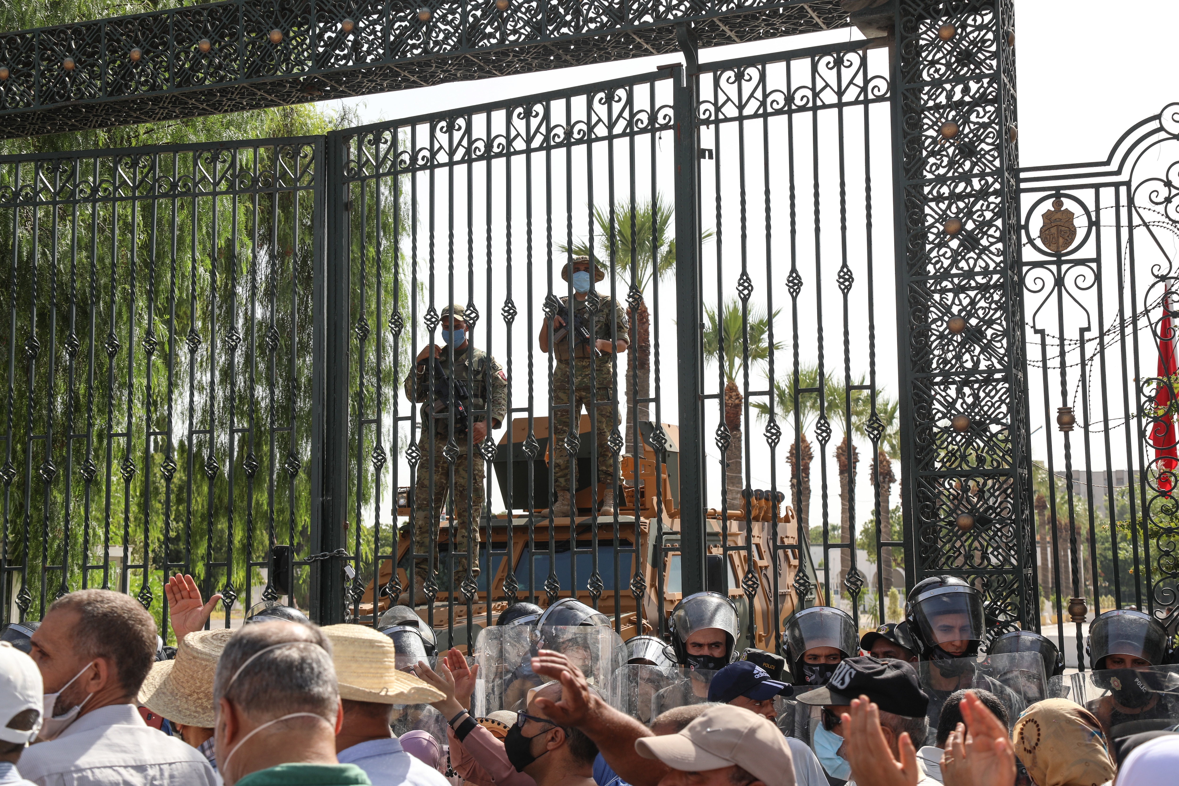 Tunisian military forces guard the area around the parliament building in the capital Tunis 26 July 2021. 