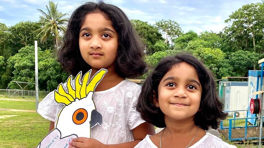 Kopika, six, and Tharnicaa, three, on Christmas Island where they have been detained since August 2019.