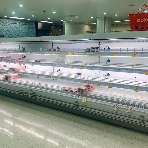 Empty shelves of meat products are seen at a supermarket in Sydney, Wednesday, January 12, 2022.