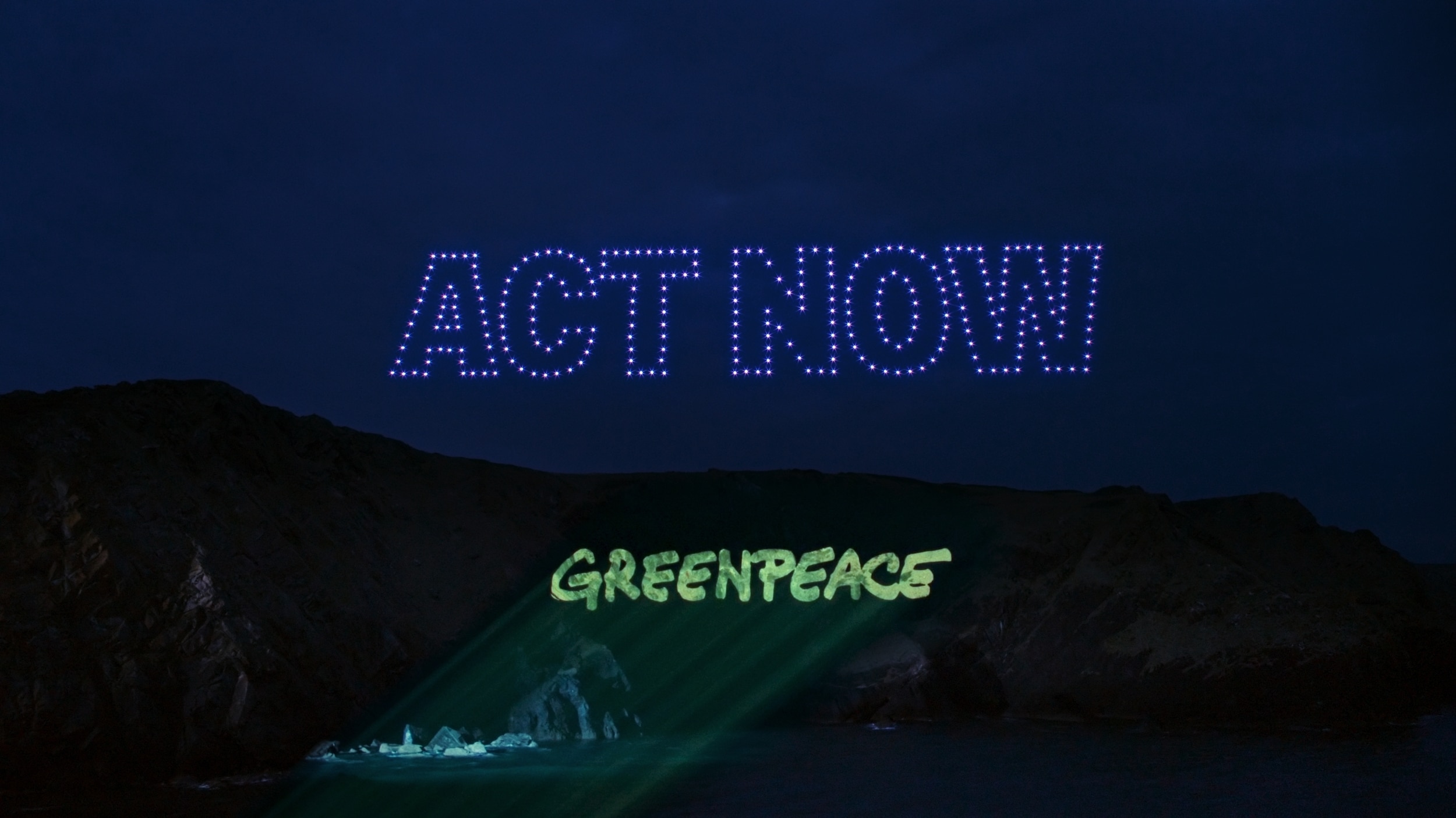 In an undated photo from Greenpeace, 300 drones are used in Cornwall to demand that world leaders at the G7 'ACT NOW' to tackle the climate change. 