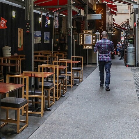Unoccupied dining tables and chairs at a restaurant in the central business district during lunch on March 18, 2020 in Melbourne, Australia.