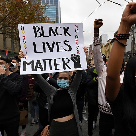 Protesters are seen during a Black Lives Matter rally in Melbourne,