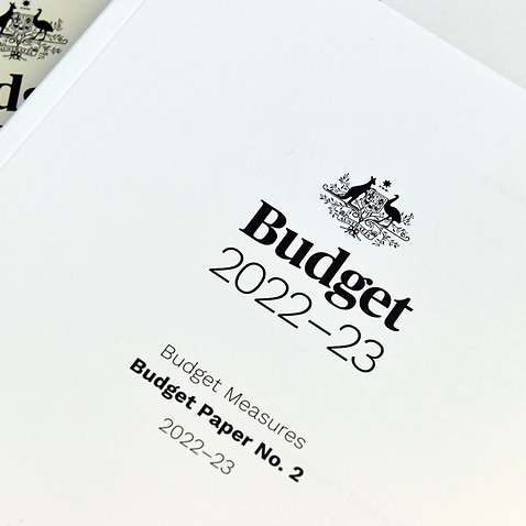 The 2022-2023 Budget books are seen at Parliament House in Canberra, Tuesday, March 29, 2022. Treasurer Josh Fydenberg will today hand down the 2022/23 federal budget. (AAP Image/Mick Tsikas) NO ARCHIVING