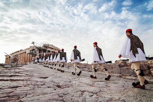 Evzones walking at the Acropolis