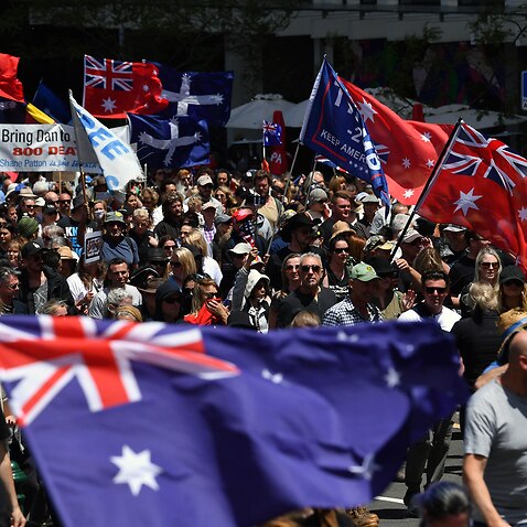 An anti-vaccination protest in Melbourne, December 2021. Far-right extremists have infiltrated such rallies in recent months.