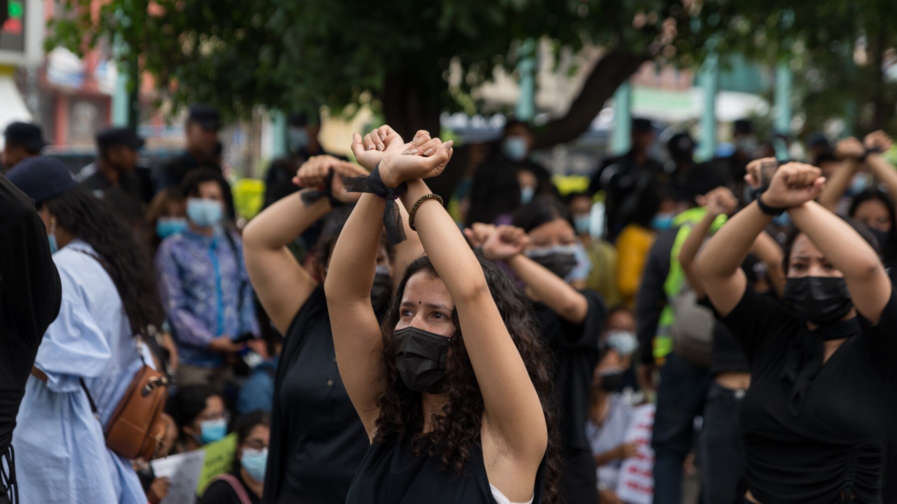Youths seen making gestures during the protest.