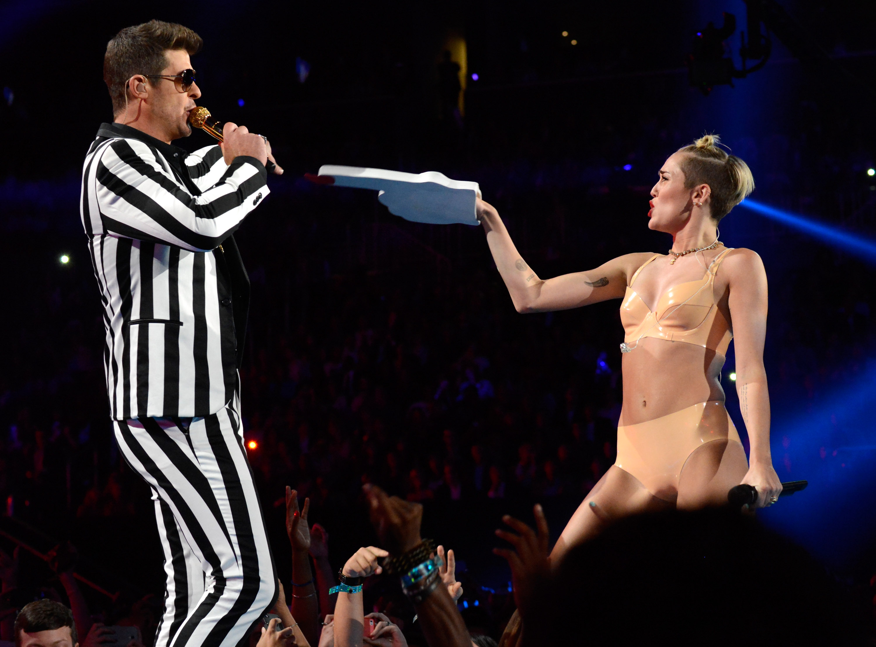 Cyrus and Robin Thicke perform a medley of "We Can't Stop" and "Blurred Lines" at the 2013 VMA's. Thicke was similarly accused of plagiarizing Marvin Gaye. 