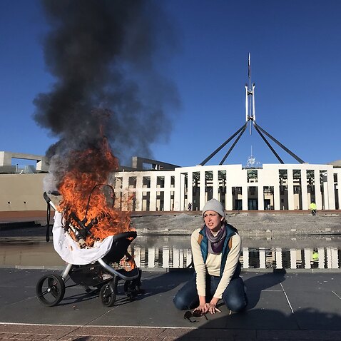 Eight protesters have been arrested for spray painting climate change slogans outside Australia's parliament and Scott Morrison's Canberra residence.