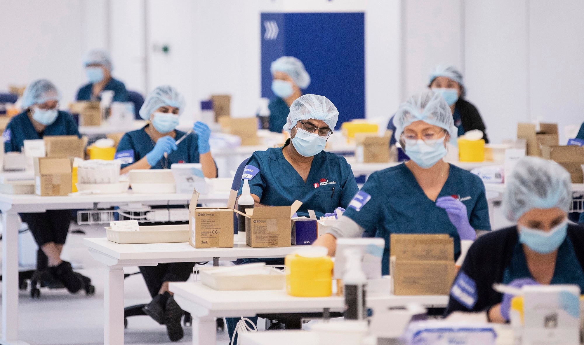 Technicians prepare vaccines at the newly opened COVID-19 Vaccination Centre in Sydney on 10 May 2021.