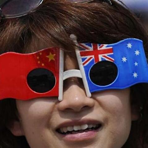 A woman demonstrates her passion for China and Australia.