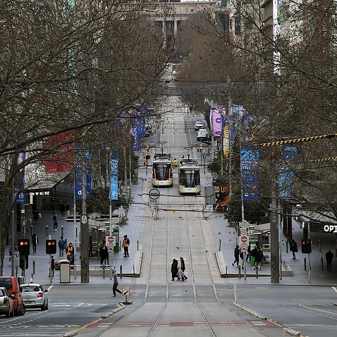 A general view along Bourke Street in Melbourne, Sunday, July 18, 2021. Victoria is in day three of its latest COVID-19 lockdown as health authorities race to keep up with fleeting transmission of the virus. (AAP Image/James Ross) NO ARCHIVING