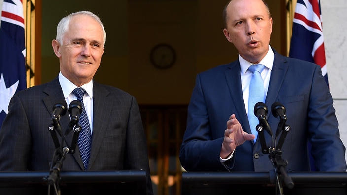 Immigration Minister Peter Dutton (R) has defended the decision to scrap the 457 visa program. 