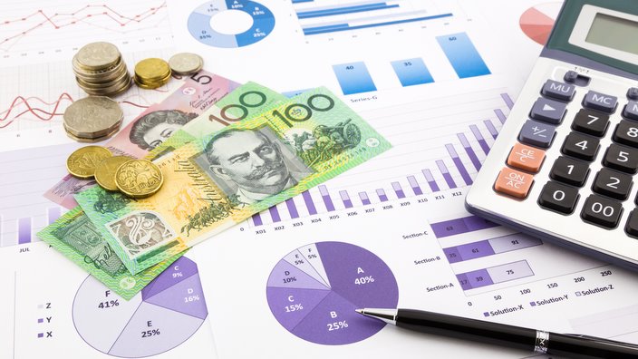 australia currency on graphs, financial planning and expense report background