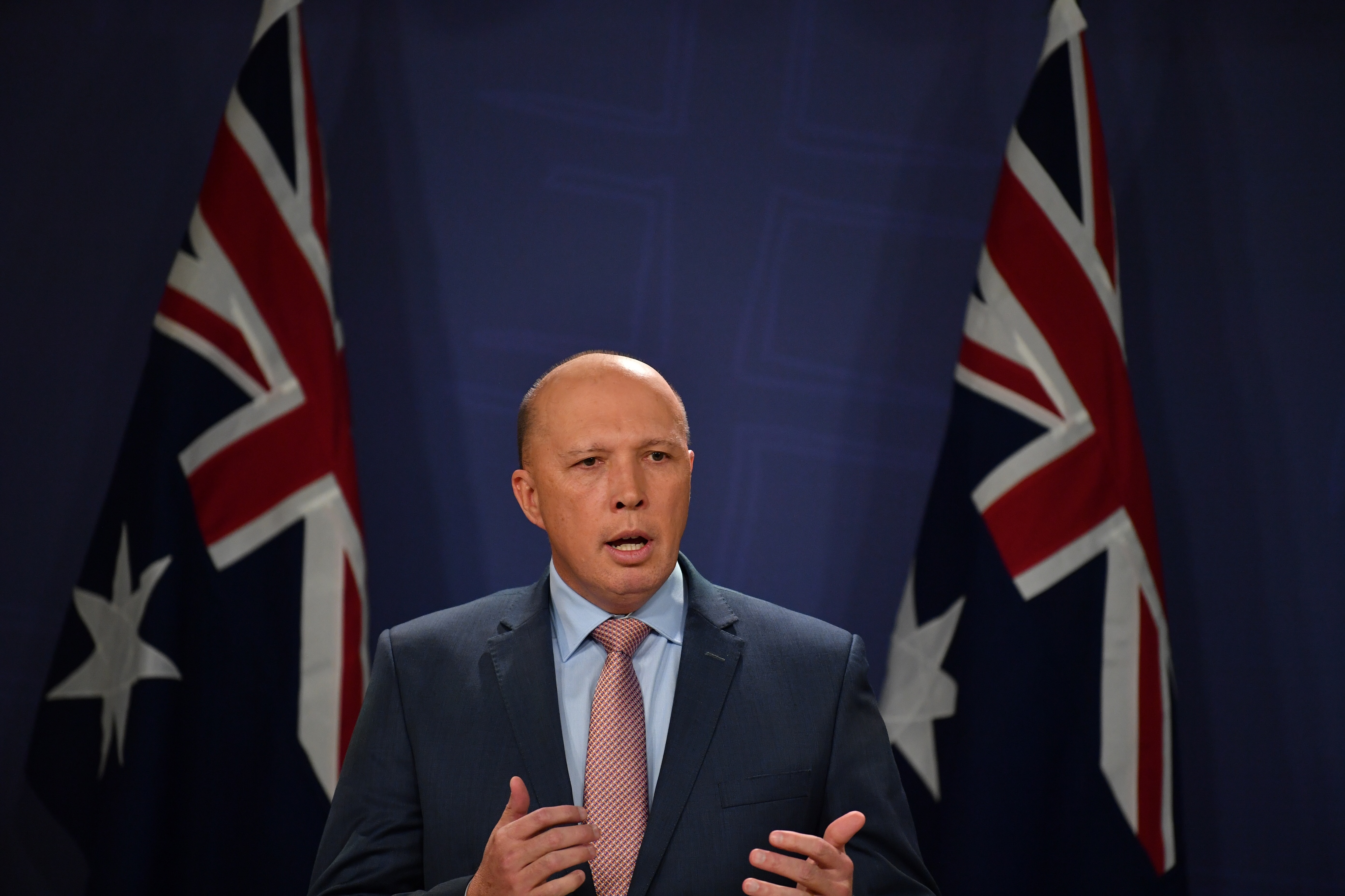 Minister for Home Affairs Peter Dutton speaks to the media during a press conference in Sydney, Thursday, June, 20, 2019. 