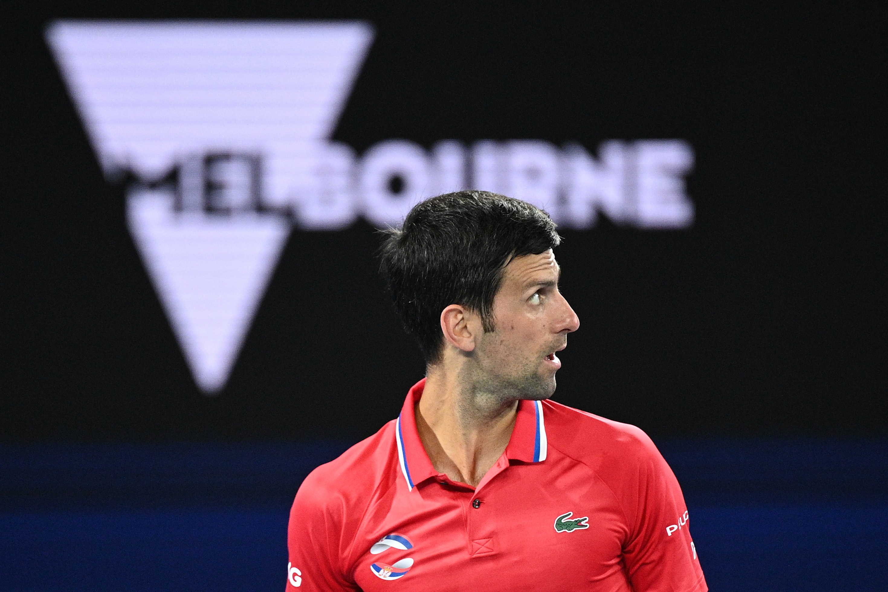 Novak Djokovic of Serbia reacts during the ATP Cup against Alexander Zverev of Germany at Melbourne Park in Melbourne, Friday, February 5, 2021. (AAP Image/Dean Lewins) NO ARCHIVING, EDITORIAL USE ONLY